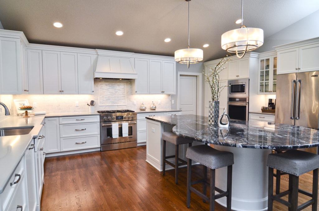 Bright and open country kitchen with wood floors