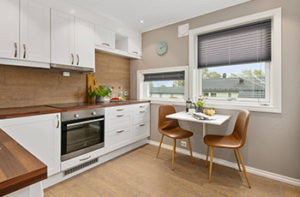 small-kitchen-with-wood-backsplash