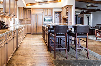 carpet-in-kitchen-with-hardwood-floor