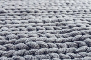 grey-area-rug-with-braided-pattern