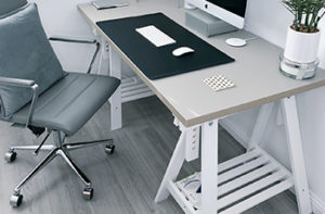 desk-and-chair-on-gray-hardwood-floor