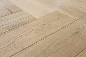 wood-floor-with-a-herringbone-pattern