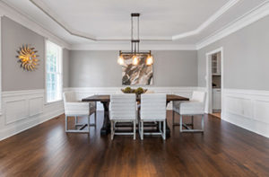 This dining room features classic hardwood flooring.