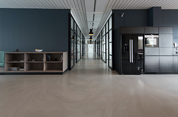 An office's lobby showcases polished concrete floors.